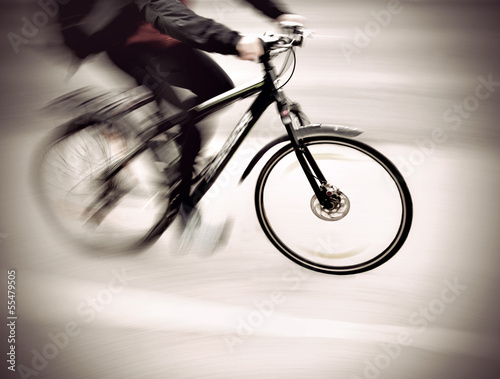 Photo: cyclist in blurred motion cyclist in blurred motion