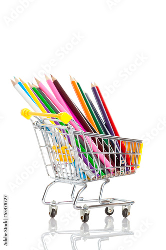 Photo: color pencils in shopping cart. color pencils in shopping cart.