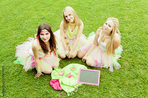 Photo: group of beautiful female friends smiling. three pretty girls group of beautiful female friends smiling. three pretty girls