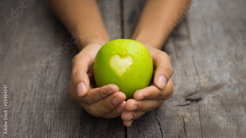 Photo: Green Apple with engraved heart Green Apple with engraved heart