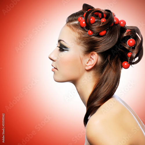 Photo: Beautiful woman with creative hairstyle Beautiful woman with creative hairstyle