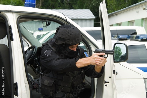 Photo: special police unit, a man with a gun special police unit, a man with a gun