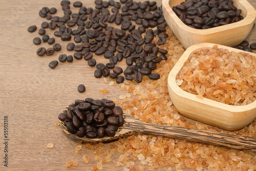 Photo: Coffee bean in the wooden spoon and rock candy sugar Coffee bean in the wooden spoon and rock candy sugar