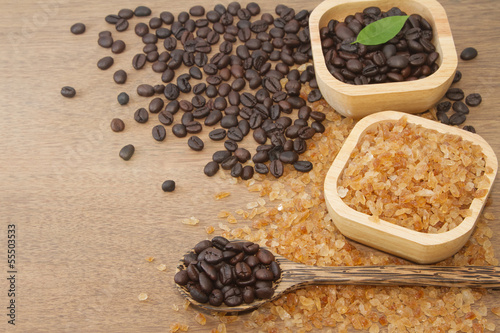 Photo: Coffee bean in the wooden spoon and rock candy sugar Coffee bean in the wooden spoon and rock candy sugar