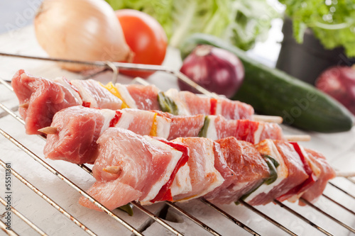 Photo: Raw shashlik and vegetables Raw shashlik and vegetables