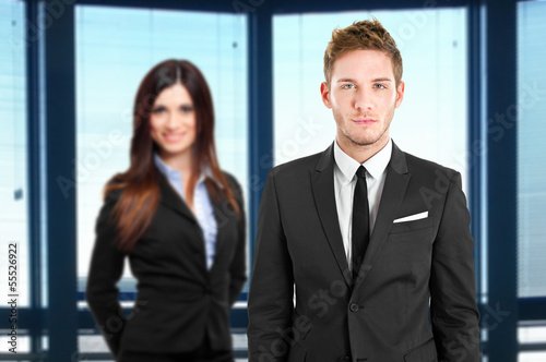 Photo: Couple of businesspeople Couple of businesspeople