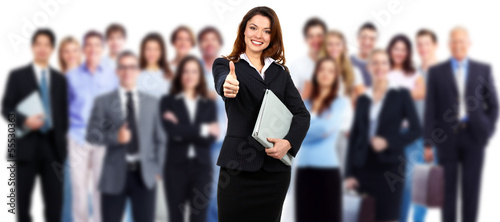 Photo: Business woman and group of workers. Business woman and group of workers.
