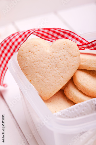 Photo: homemade heart cookies on wooden background homemade heart cookies on wooden background