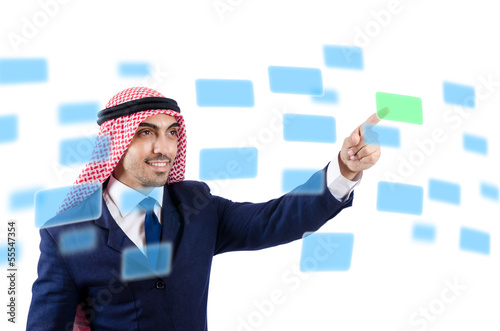 Photo: Arab man pressing virtual buttons Arab man pressing virtual buttons