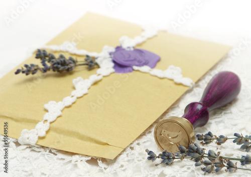 Photo: wax stamp with letter isolated on white wax stamp with letter isolated on white