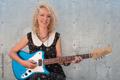 Photo: smiling electric guitar girl smiling electric guitar girl