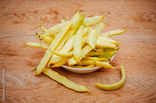 Photo: Yellow Kidney Beans In A Bowl On Wooden Table Yellow Kidney Beans In A Bowl On Wooden Table