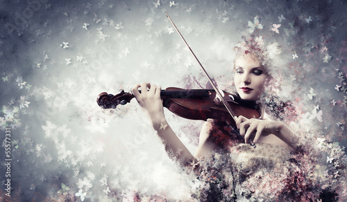 Photo: Gorgeous woman playing violin Gorgeous woman playing violin