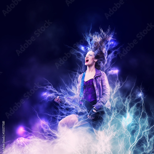 Photo: Rock passionate girl with black wings Rock passionate girl with black wings