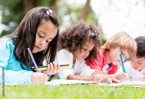Photo: Group of children coloring Group of children coloring