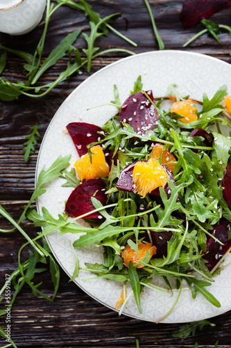 Photo: fresh salad with arugula, orange and beetroot fresh salad with arugula, orange and beetroot