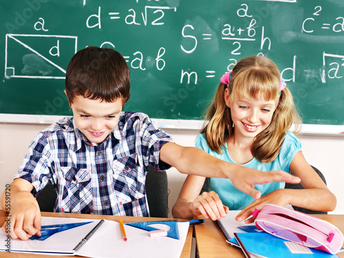 Photo: School children girl and boy. School children girl and boy.