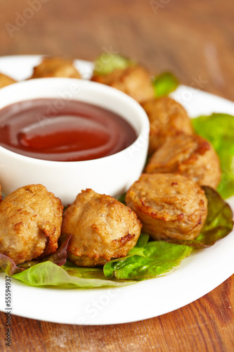 Photo: Meatball appetizers with a dipping sauce Meatball appetizers with a dipping sauce
