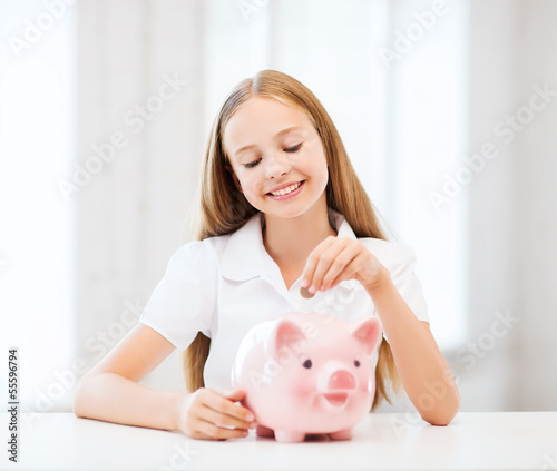 Photo: child with piggy bank child with piggy bank