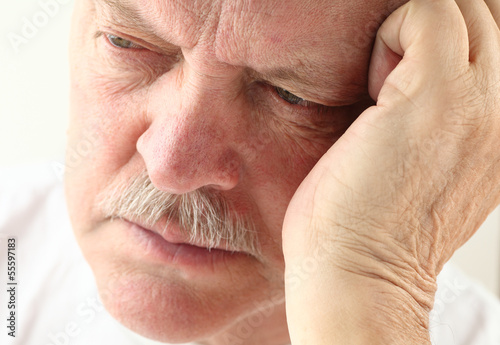 Photo: older man looking depressed older man looking depressed