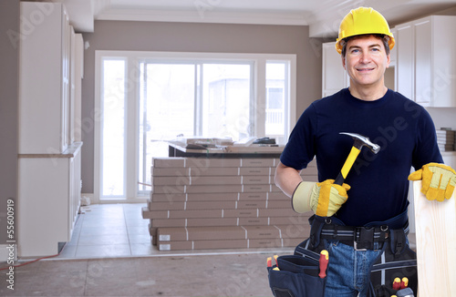 Photo: Handyman with a hammer. Handyman with a hammer.