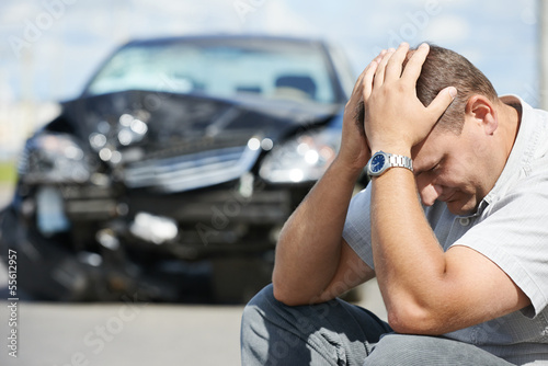 Photo: upset man after car crash upset man after car crash