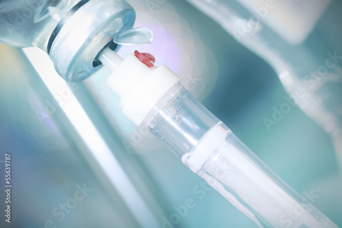 Photo: IV drip in hospital. Abstract medical background IV drip in hospital. Abstract medical background