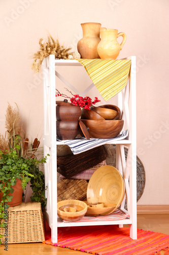 Photo: Beautiful white shelves with tableware and decor, Beautiful white shelves with tableware and decor,
