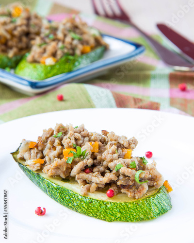 Photo: Tasty appetizer, fried meat beef on slice of grilled zucchini Tasty appetizer, fried meat beef on slice of grilled zucchini