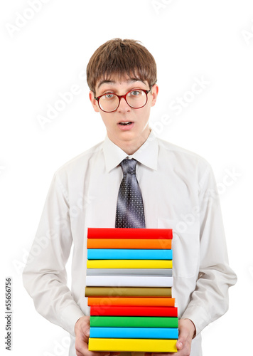 Photo: Surprised Student holding Pile of the Books Surprised Student holding Pile of the Books