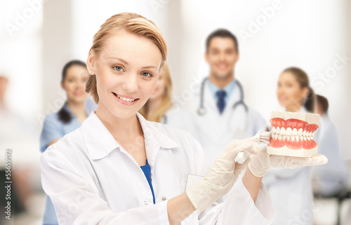 Photo: doctor with big jaws and toothbrush doctor with big jaws and toothbrush