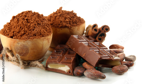 Photo: Composition of chocolate sweets, cocoa and spices, isolated Composition of chocolate sweets, cocoa and spices, isolated