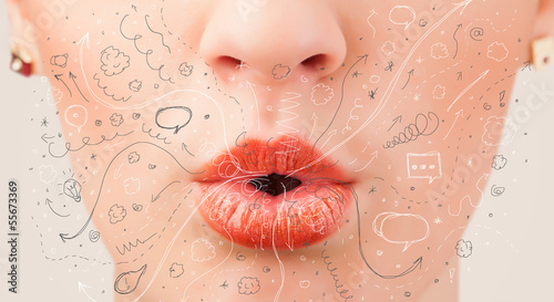Photo: Pretty woman mouth blowing hand drawn icons and symbols Pretty woman mouth blowing hand drawn icons and symbols
