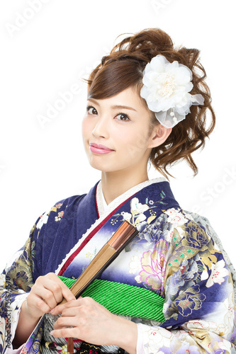 Photo: Beautiful asian kimono woman on white background Beautiful asian kimono woman on white background