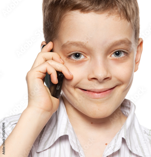 Photo: Boy, talking on the phone Boy, talking on the phone