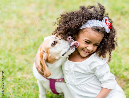 Photo: Happy girl with a dog Happy girl with a dog