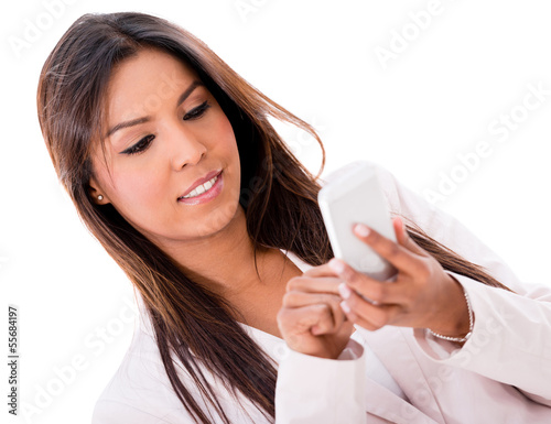 Photo: Business woman texting Business woman texting