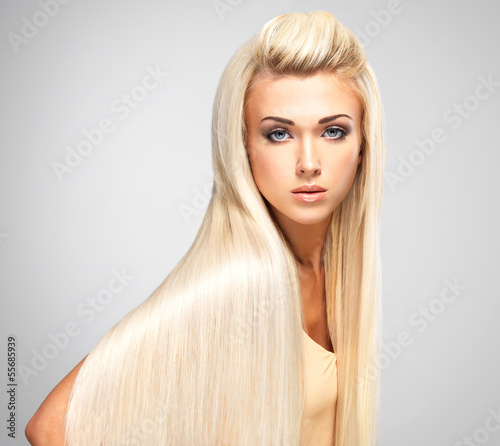 Photo: Blond woman with long straight hairs Blond woman with long straight hairs