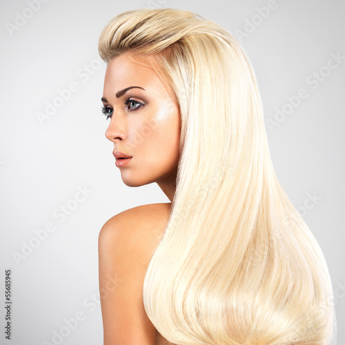 Photo: Blond woman with long straight hairs Blond woman with long straight hairs