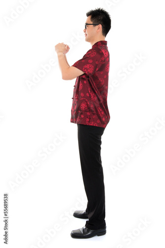 Photo: Fullbody Chinese cheongsam male greeting Fullbody Chinese cheongsam male greeting
