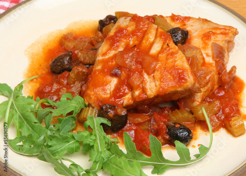 Photo: Italian Tuna Steaks Poached in Tomato and White Wine Sauce. Italian Tuna Steaks Poached in Tomato and White Wine Sauce.