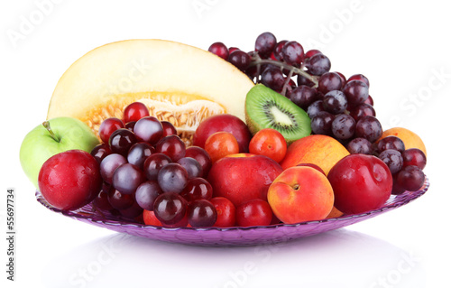 Photo: Assortment of juicy fruits isolated on white Assortment of juicy fruits isolated on white
