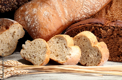 Photo: Much bread on wooden board Much bread on wooden board