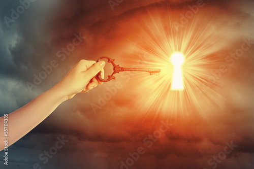 Photo: Hand with key Hand with key
