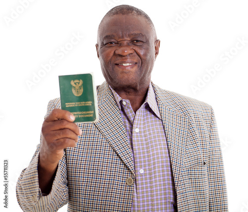 Photo: senior south african man holding ID book senior south african man holding ID book