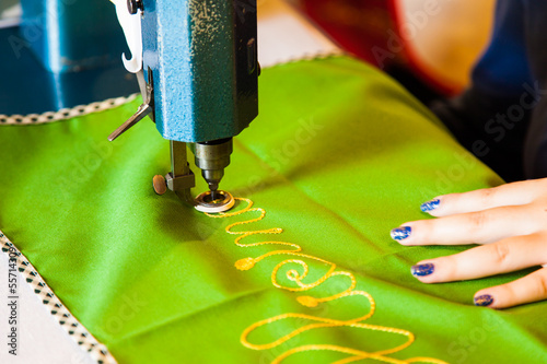 Photo: Lady hand at sewing Lady hand at sewing