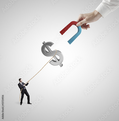 Photo: businessman holding dollar businessman holding dollar