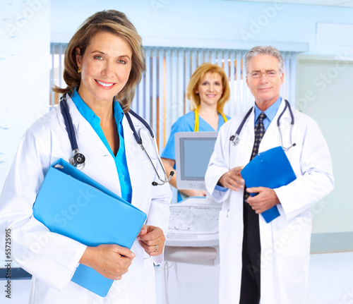 Photo: Smiling medical doctor woman. Smiling medical doctor woman.