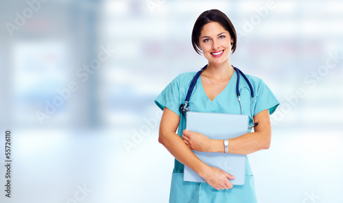 Photo: Smiling medical doctor woman. Smiling medical doctor woman.