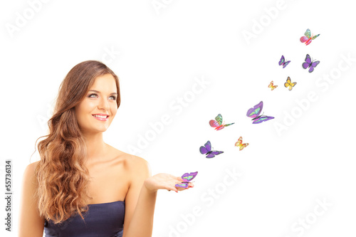 Photo: Beautiful young female with many colorful butterflies Beautiful young female with many colorful butterflies